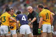 30 August 2009; Referee Gearoid O Conamha intervenes as Kerry and Meath players tussle. GAA All-Ireland Senior Football Championship Semi-Final, Kerry v Meath, Croke Park, Dublin. Picture credit: Brian Lawless / SPORTSFILE
