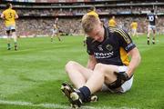 30 August 2009; Kerry's Tommy Walsh holds his leg during the match. GAA All-Ireland Senior Football Championship Semi-Final, Kerry v Meath, Croke Park, Dublin. Picture credit: Brian Lawless / SPORTSFILE