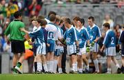 30 August 2009; Players from both sides shake hands after the game. Go Games during half-time in the Kerry v Meath game. Croke Park, Dublin. Picture credit: Ray McManus / SPORTSFILE