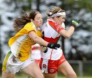 29 August 2009; Tracey Kelly, Derry, in action against Seanin Daykin, Antrim. TG4 All-Ireland Ladies Football Junior Championship Semi-Final, Antrim v Derry, Wolfe Tones GAA Club, Kildress, Co. Tyrone. Picture credit: Michael Cullen / SPORTSFILE