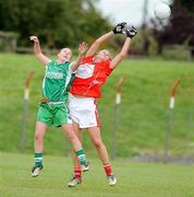 29 August 2009; Tara Lynch, Louth, in action against Maggie O'Brien, Limerick. TG4 All-Ireland Ladies Football Junior Championship Semi-Final, Limerick v Louth, Athy, Co. Kildare. Picture credit: Matt Browne / SPORTSFILE