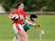 29 August 2009; Orlaith Kirk, Louth, in action against Hazel Fogarty, Limerick. TG4 All-Ireland Ladies Football Junior Championship Semi-Final, Limerick v Louth, Athy, Co. Kildare. Picture credit: Matt Browne / SPORTSFILE