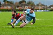 5 December 2015; James McInerney, Garryowen, scores the first try of the game despite the attempted tackle of Michael McGrath, Clontarf. Ulster Bank League, Division 1A, Clontarf v Garryowen. Castle Avenue, Clontarf, Dublin. Picture credit: Matt Browne / SPORTSFILE