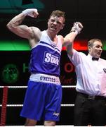 5 December 2015; Ray Moylette, St Annes, is declared winner over Wayne Kelly, Athlone, following their 64kg bout. IABA National Elite Championships. National Boxing Stadium, Dublin. Picture credit: Ramsey Cardy / SPORTSFILE