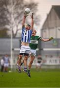 6 December 2015; Michael Darragh Macauley,  Ballyboden St Enda's, wins possession ahead of Brian Glynn, Portlaoise. AIB Leinster GAA Senior Club Football Championship Final, Portlaoise v Ballyboden St Enda's. O'Connor Park, Tullamore, Co. Offaly. Picture credit: Ray McManus / SPORTSFILE