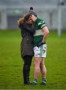 6 December 2015; Portlaoise's Paul Cahillane, who kicked a late free wide, is comforted after the game by Maeve O'SullEvan.  AIB Leinster GAA Senior Club Football Championship Final, Portlaoise v Ballyboden St Enda's. O'Connor Park, Tullamore, Co. Offaly. Picture credit: Ray McManus / SPORTSFILE