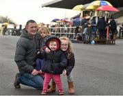 6 December 2015; David Reddy from Blessington holding Caomhe Reddy, age 3, alongside Laura Flood, age 1, and Caitlyn Reddy, 5, before the races. Horse Racing from Punchestown. Punchestown, Co. Kildare. Picture credit: Cody Glenn / SPORTSFILE