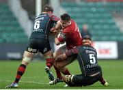 6 December 2015; Niall Scannell, Munster, is tackled by Lewis Evans and Rynard Landman, right, Newport Gwent Dragon. Guinness PRO12, Round 9, Newport Gwent Dragons v Munster. Rodney Parade, Newport, Wales. Picture credit: Ben Evans / SPORTSFILE