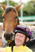 5 September 2009; Jockey Mick Kinane with Sea The Stars after winning the Tattersalls Millions Irish Champion Stakes. Leopardstown Racecourse, Dublin. Picture credit: Ray McManus / SPORTSFILE