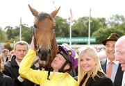 5 September 2009; Jockey Mick Kinane with winning connections after Sea The Stars won the Tattersalls Millions Irish Champion Stakes. Leopardstown Racecourse, Dublin. Picture credit: Ray McManus / SPORTSFILE
