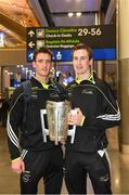 10 December 2015; Pictured are Colin Fennelly and Joey Holden, right, with the Liam MacCarthy cup, before departing for Austin, Texas, USA. GAA All-Star Tour 2015, sponsored by Opel, departs for Austin, Texas, USA. Dublin Airport, Dublin. Picture credit: Ray McManus / SPORTSFILE