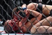 10 December 2015; Paige VanZant, below, in action against Rose Namajunas during their strawweight bout. UFC Fight Night: VanZant v Namajunas, The Chelsea at The Cosmopolitan, Las Vegas, USA. Picture credit: Ramsey Cardy / SPORTSFILE