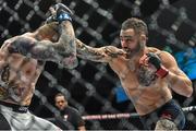 10 December 2015; Santiago Ponzinibbio, right, in action against Andreas Ståhl during their welterweight bout. UFC Fight Night: VanZant v Namajunas, The Chelsea at The Cosmopolitan, Las Vegas, USA. Picture credit: Ramsey Cardy / SPORTSFILE