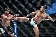 10 December 2015; Zubaira Tukhugov, left, in action against Phillipe Nover during their featherweight bout. UFC Fight Night: VanZant v Namajunas, The Chelsea at The Cosmopolitan, Las Vegas, USA. Picture credit: Ramsey Cardy / SPORTSFILE