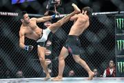 10 December 2015; Zubaira Tukhugov, right, in action against Phillipe Nover during their featherweight bout. UFC Fight Night: VanZant v Namajunas, The Chelsea at The Cosmopolitan, Las Vegas, USA. Picture credit: Ramsey Cardy / SPORTSFILE