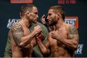 10 December 2015; Frankie Edgar, left, faces off against  Chad Mendes ahead of their featherweight bout. The Ultimate Fighter Finale: Weigh-In, MGM Grand Garden Arena, Las Vegas, USA. Picture credit: Ramsey Cardy / SPORTSFILE