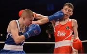 11 December 2015; Regan Buckley, St Teresa's Boxing Club, Co. Wicklow, left, exchanges punches with Stephen McKenna, Old School Boxing Club, Co. Monaghan, during their 49kg bout. IABA Elite Boxing Championship Finals, National Stadium, Dubllin. Picture credit: Piaras Ó Mídheach / SPORTSFILE