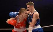 11 December 2015; Brendan Irvine, St Paul's Boxing Club, Co. Antrim, right, exchanges punches with T.J. Waite, Ormeau Road Boxing Club, Belfast, Co. Antrim, during their 52kg bout. IABA Elite Boxing Championship Finals, National Stadium, Dubllin. Picture credit: Piaras Ó Mídheach / SPORTSFILE