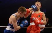 11 December 2015; Kurt Walker, Canal Boxing Club, Lisburn, right, exchanges punches with Myles Casey, St Francis Boxing Club, Limerick, during their 56kg bout. IABA Elite Boxing Championship Finals, National Stadium, Dubllin. Picture credit: Piaras Ó Mídheach / SPORTSFILE