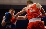 11 December 2015; Raymond Moylette, St. Anne's Boxing Club, Co. Mayo, left, exchanges punches with Dean Walsh, St Joseph's/St Ibar's Boxing Club, Co. Wexford, during their 64kg bout. IABA Elite Boxing Championship Finals, National Stadium, Dubllin. Picture credit: Piaras Ó Mídheach / SPORTSFILE