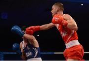 11 December 2015; Adam Nolan, St Fergals Bray, Co. Wicklow, right, exchanges punches with Martin Stokes, Holy Family Drogheda Boxing Club, Co. Louth, during their 69kg bout. IABA Elite Boxing Championship Finals, National Stadium, Dubllin. Picture credit: Piaras Ó Mídheach / SPORTSFILE