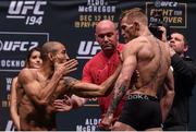 11 December 2015; Conor McGregor, right, faces off against Jose Aldo ahead of their featherweight bout. UFC 194: Weigh-In, MGM Grand Garden Arena, Las Vegas, USA. Picture credit: Ramsey Cardy / SPORTSFILE