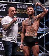 11 December 2015; Conor McGregor speaks with UFC commentator Joe Rogan after weighing in for his featherweight bout against Jose Aldo. UFC 194: Weigh-In, MGM Grand Garden Arena, Las Vegas, USA. Picture credit: Ramsey Cardy / SPORTSFILE