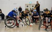 12 December 2015; Conn Nagle, Ulster, in action against Ellie Sheehy, left, and Maurice Noonan, Munster, during the final at the M. Donnelly GAA Wheelchair Hurling Interprovincial All-Star Awards & All-Ireland Finals. I.T. Blanchardstown, Blanchardstown, Dublin 15. Picture credit: Oliver McVeigh / SPORTSFILE