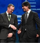 12  December 2015; Northern Ireland manager Michael O'Neill, left, shakes hands with Joachim Low, Germany manager, after the UEFA EURO Final Tournament Draw. Le Palais des Congrès de Paris, Paris, France.  Picture credit: David Maher / SPORTSFILE