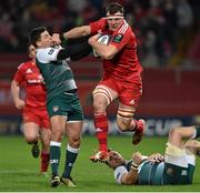 12 December 2015; Robin Copeland, Munster, is tackled by Ben Youngs, left, and Ed Slater, Leicester Tigers. European Rugby Champions Cup, Pool 4, Round 3, Munster v Leicester Tigers. Thomond Park, Limerick. Picture credit: Diarmuid Greene / SPORTSFILE