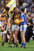 6 September 2009; Kilkenny's Jackie Tyrrell commiserates with Shane McGrath, Tipperary, after the final whistle. GAA Hurling All-Ireland Senior Championship Final, Kilkenny v Tipperary, Croke Park, Dublin. Picture credit: Brendan Moran / SPORTSFILE