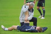 8 September 2009; Northern Ireland Physio Terry Hayes stretches the hamstring of Steve Davis during squad training ahead of their 2010 FIFA World Cup Qualifier against Slovakia on Wednesday. Greenmount College, Co. Antrim. Picture credit: Oliver McVeigh / SPORTSFILE