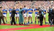 6 September 2009; President Mary McAleese shakes hands with Tipperary's John O'Brien before the game. GAA Hurling All-Ireland Senior Championship Final, Kilkenny v Tipperary, Croke Park, Dublin. Picture credit: Oliver McVeigh / SPORTSFILE