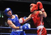 9 September 2009; John Joe Nevin, left, Ireland, in action against Yu Gu, China, during their Bantamweight 54kg bout. AIBA World Boxing Championships, Quarter-Finals, Assago, Milan, Italy. Picture credit: David Maher / SPORTSFILE