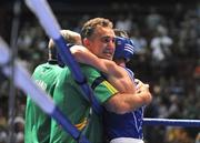 9 September 2009; John Joe Nevin, Ireland, celebrates after victory over Yu Gu, China, with head coach Billy Walsh after their Bantamweight 54kg bout. AIBA World Boxing Championships, Quarter-Finals, Assago, Milan, Italy. Picture credit: David Maher / SPORTSFILE