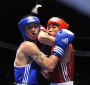 9 September 2009; John Joe Nevin, Ireland, left, in action against Yu Gu, China, during their Bantamweight 54kg bout. AIBA World Boxing Championships, Quarter-Finals, Assago, Milan, Italy. Picture credit: David Maher / SPORTSFILE