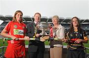 8 September 2009; President of the Camogie association Joan O'Flynn and Gary Desmond, CEO of Gala, with senior captains Ann Dalton, Kilkenny, right, and Cork captain Amanda O'Regan, left, and the O'Duffy cup at a photocall ahead of the Gala All-Ireland Camogie Championship. Croke Park, Dublin. Picture credit: Pat Murphy / SPORTSFILE