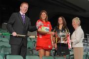 8 September 2009; President of the Camogie association Joan O'Flynn and Gary Desmond, CEO of Gala, with senior captains Ann Dalton, Kilkenny, right, and Cork captain Amanda O'Regan, left, and the O'Duffy cup at a photocall ahead of the Gala All-Ireland Camogie Championship. Croke Park, Dublin. Picture credit: Pat Murphy / SPORTSFILE