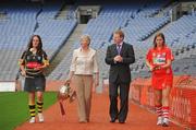 8 September 2009; President of the Camogie association Joan O'Flynn and Gary Desmond, CEO of Gala, with senior captains Ann Dalton, Kilkenny, left, and Cork captain Amanda O'Regan, left, and the O'Duffy cup at a photocall ahead of the Gala All-Ireland Camogie Championship. Croke Park, Dublin. Picture credit: Pat Murphy / SPORTSFILE