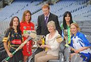 8 September 2009; President of the Camogie association Joan O'Flynn, Gary Desmond, CEO of Gala, senior captains Ann Dalton, Kilkenny and Amanda O'Regan, Cork, with the O'Duffy Cup. Áine Lyng, Waterford, and the Offaly captain Marion Crean with the New Ireland Junior Cup at a photocall in advance of the Gala All-Ireland Camogie Championship. Croke Park, Dublin. Picture credit: Pat Murphy / SPORTSFILE