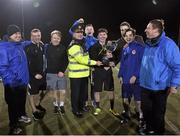 11 December 2015; Jack Nolan, Assistant Commissioner at An Garda presents the Champions League Cup to Bayerneverlosing captain James Doona, FAI Director of Competition at the Late Nite League Finals, Irishtown Stadium, Strand St, Dublin 4. Picture credit: Matt Browne / SPORTSFILE