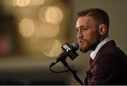 12 December 2015; UFC featherweight champion Conor McGregor during a post-fight press conference. UFC 194: Jose Aldo v Conor McGregor, MGM Grand Garden Arena, Las Vegas, USA. Picture credit: Ramsey Cardy / SPORTSFILE