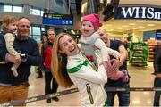 14 December 2015; Team Ireland athlete Lizzie Lee, who won a team bronze medal in the Senior Women's event, is welcomed home by her 18 month old daughter Lucy Kelleher in Dublin Airport on their return home from the SPAR European Cross Country Championship in France. Terminal 2, Dublin Airport, Dublin. Photo by Sportsfile