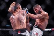 12 December 2015; Max Holloway, left, in action against Jeremy Stephens during their featherweight bout. UFC 194: Undercard, MGM Grand Garden Arena, Las Vegas, USA. Picture credit: Ramsey Cardy / SPORTSFILE