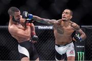 12 December 2015; Yancy Medeiros, right, in action against John Makdessi during their lightweight bout. UFC 194: Undercard, MGM Grand Garden Arena, Las Vegas, USA. Picture credit: Ramsey Cardy / SPORTSFILE