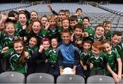15 December 2015; Dublin footballer Jonny Cooper with pupils from Gaelscoil Inchicore at the launch of the Bord na Móna Leinster GAA Series. Croke Park, Dublin. Photo by Sportsfile
