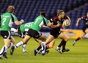 11 September 2009; Edinburgh winger Mark Robertson breaks through the Connacht cover to score the opening try of the game. Celtic League - Edinburgh v Connacht, Murrayfield Stadium, Edinburgh, Scotland. Picture credit: David Gibson / SPORTSFILE