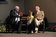 12 September 2009; Trainer M McDonagh in conversation with racegoers Peter Cotter and seven-year-old Enda Mallon, both from Limerick, before the days racing. The Curragh Racecourse, Co. Kildare. Picture credit: Ray McManus / SPORTSFILE