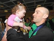 13 September 2009; John Joe Nevin, with his baby sister Alice, age 2, on his return to Dublin Airport after winning the Bronze Medal at the 2009 AIBA World Boxing Championships Final in Assago, Milan, Italy. Dublin Airport, Dublin. Picture credit: David Maher / SPORTSFILE