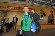 13 September 2009; Boxer John Joe Nevin celebrates on his return to Dublin Airport after winning the Bronze Medal at the 2009 AIBA World Boxing Championships Final, Assago, Milan, Italy. Dublin Airport, Dublin. Picture credit: David Maher / SPORTSFILE